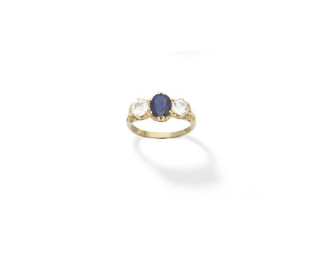 Sapphire and diamond three-stone ringThe oval-cut sapphire set between two old brilliant-cut diamonds, diamonds approx. 1.00c