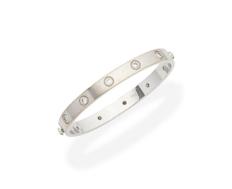 Cartier: diamond 'Love' bangleDecorated with ten brilliant-cut diamonds,  signed Cartier, numbered, inner diameters 5.3cm x 4