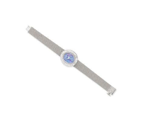 Vacheron &amp; Constantin: opal and diamond dress watchThe oval shaped opal dial in a radiating baguette-cut diamond surround