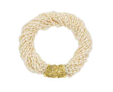 Elizabeth Gage: Cultured pearl and diamond necklace, 1994The multi-strand of freshwater cultured pearls, to a textured 18 car