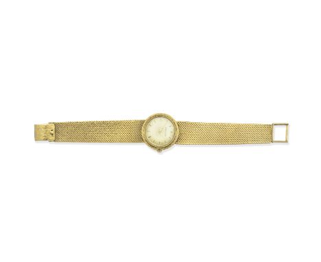 Jaeger-LeCoultre: Gold WristwatchThe cream circular dial with baton hourmarkers, with a crosshatch design bezel, to an integr