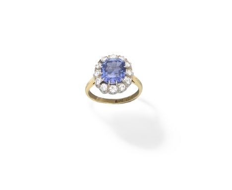 Sapphire and diamond cluster ringThe cushion-shaped sapphire within a surround of brilliant-cut diamonds, ring size approx. N