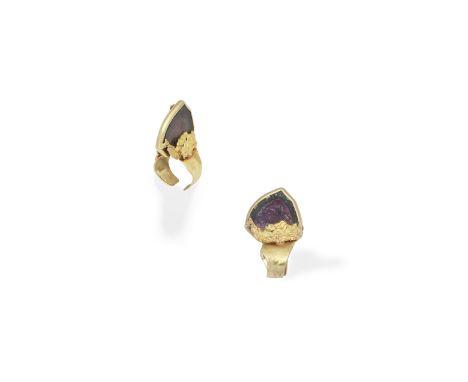 Roland Schad: watermelon tourmaline ring, circa 1970The collet-set watermelon tourmaline slice to a textured abstract mount, 
