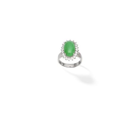 Jade and diamond ringThe oval jade cabochon within a brilliant-cut diamond surround, diamonds approx. 0.80ct total, ring size