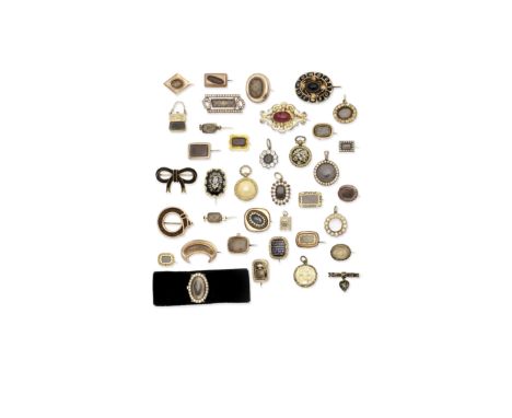 Collection of mourning jewellery, late 18th - 19th centuryComprising eight pendants and twenty-eight brooches, some with enam