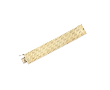 Fancy link bracelet, 1964An articulated 9 carat gold brick-link bracelet, makers mark EJLtd, London Hallmark, length 18.6cmFo