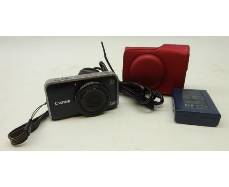 Canon SX-210 digital camera with charger and memory card in red carry case   Condition Report   Click here for further images