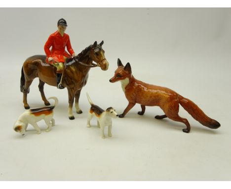 Beswick Huntsman on bay horse, two hounds and fox (4)   Condition Report  Fox has a repaired tail & very light crazing. Horse