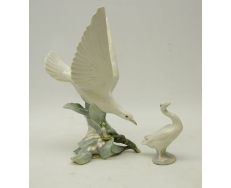 Lladro dove figurine perched on a branch and Lladro goose (2)   Condition Report   Click here for further images, condition, 