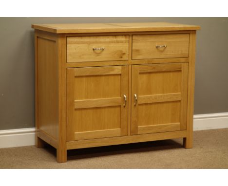 Light oak sideboard, two drawers and two cupboards, W101cm, H83cm, D48cm   Condition Report   Click here for further images, 