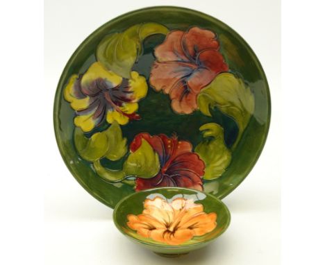 Moorcroft 'Hibiscus' pattern footed dish, D18.5cm and pin dish, both labelled 'Potter To The Late Queen Mary' (2)   Condition