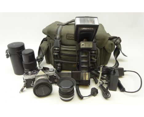 Olympus OM-2N SLR camera, three Olympus Zuiko lenses; 50mm f1.8, 75-150mm f4 & 24mm f2.8, flash unit etc in carry case    Con