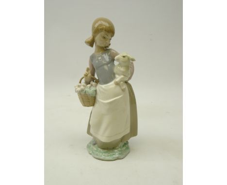 Lladro figure of a lady with flower basket holding a lamb, H25cm    Condition Report   Click here for further images, conditi