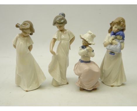 Four Nao figurines; two girls in white dresses, a girl holding a puppy and a girl carrying a doll (4)   Condition Report   Cl