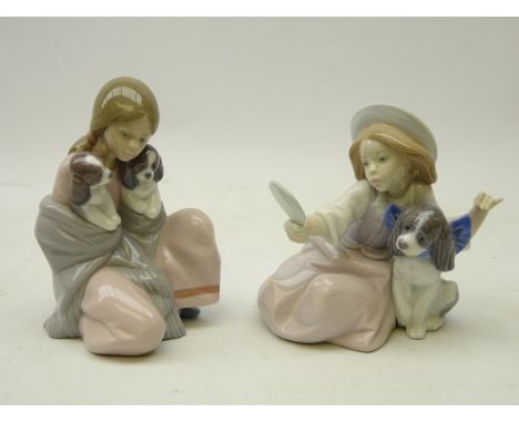 Two Lladro figurines; 'Who's the Fairest' No. 5468 and 'Snuggle Up' No. 6226, H16.5cm(2)   Condition Report   Click here for 