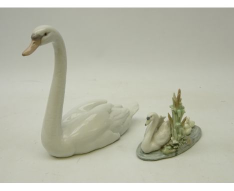 Two Lladro figurines; Swan No. 5230, H21.5cm and 'Follow me' No. 5722 (2)   Condition Report   Click here for further images,