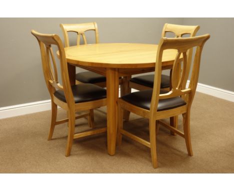 Solid light oak circular extending dining table with fold out leaf (H77cm, D116cm - 156cm (extended)), and four ash dining ch