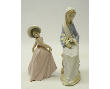 Two Lladro figurines; Seated lady with lilies, H24cm and 'Iris' No. 6276 (2)   Condition Report   Click here for further imag