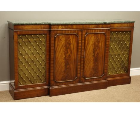 Regency style breakfront mahogany side cabinet, green marble top above two brass grilled and two curl veneer doors, on a skir