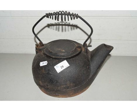 Cast iron teapot with looped handle