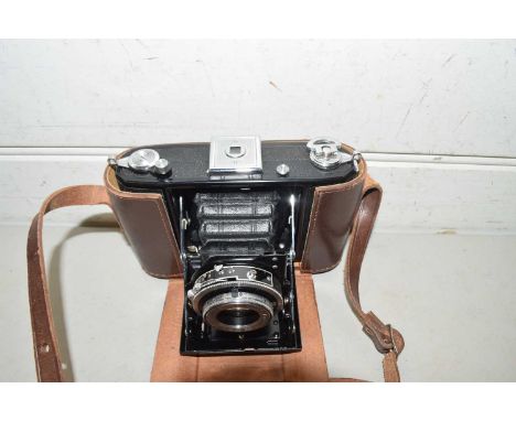 A Zeiss Ikon camera in leather case
