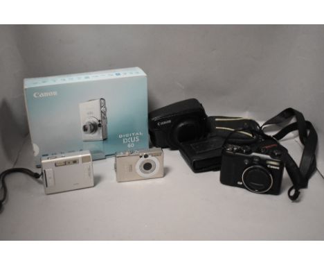 Three digital cameras. A Canon G9 with Canon zoom 6X IS 7.4-44.4mm 1:2,8-4,9, a Canon IXUS60 with Canon zoom 3X 5.8-17.4.mm 1