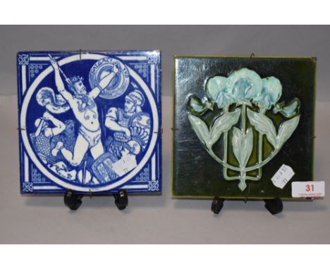 Two antique tiles including a Minton John Moyr design and an Art Nouveau pattern AF