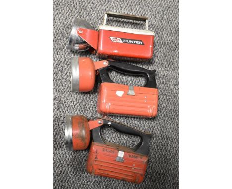 Three vintage red bodied torches