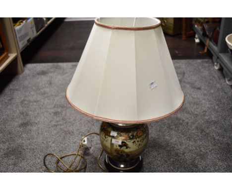 A modern Oriental Satsuma design pottery table lamp, with modern fitting and shade