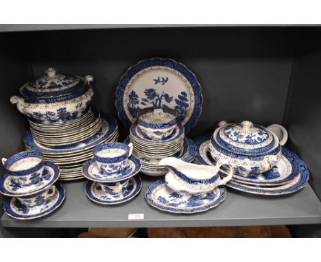 A large collection of Booths Real Old Willow A8025 dinner service, to include tureens, plates, cups and saucers and more.