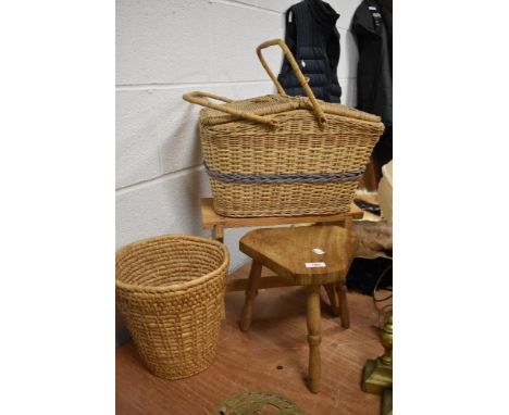 A woven wicker picnic hamper, woven wicker waste paper basket, crochet stool and three legged stool.