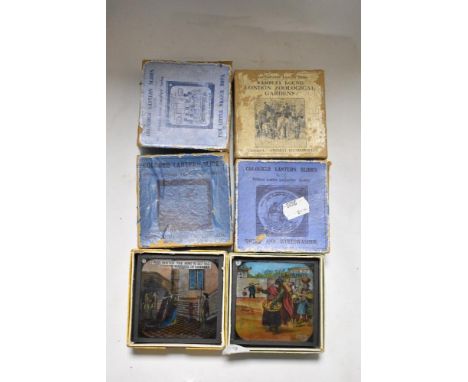 Six late Victorian coloured glass lantern slides including London Zoo, Conquest of the air, Boys and Aladdin