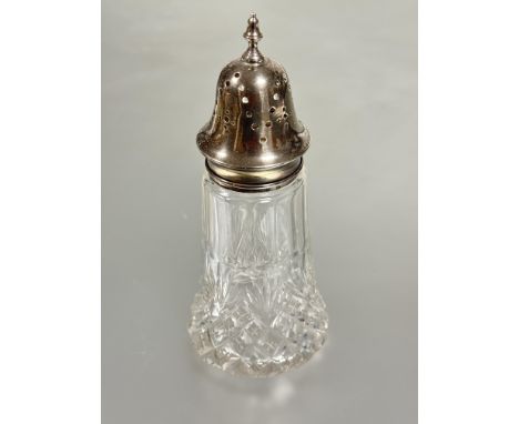 A Birmingham silver topped sugar castor on crystal slice cut flared base with urn finial to top H x 16.5cm D x 7cm Birmingham