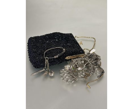 A vintage 1960s black beaded evening bag with chain handle and lined interior L x 2cm and a collection of chain, ring finger 