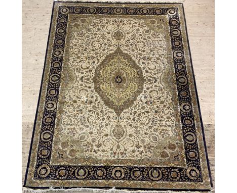 A fine / finely knotted Persian Tabriz design carpet, silk and cotton blend, first half of the 20th century, the field with f