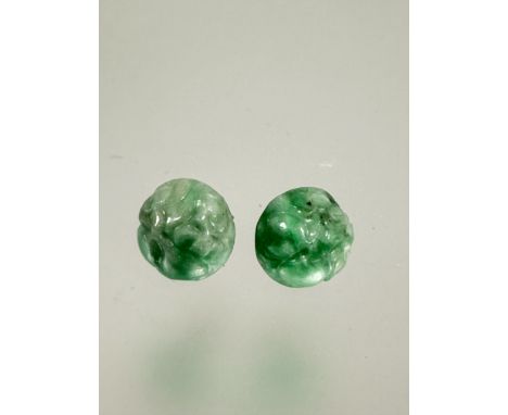 A pair of Chinese carved circular celadon jade stud earrings mounted in white metal D x 1cm 3.52g