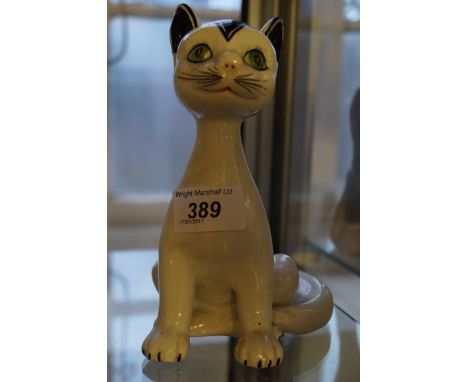 An unusual Italian ceramic model of a seated cat.