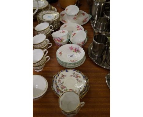 A Shelley bone china floral part tea service together with a Royal Doulton part tea service. CONDITION REPORT: Shelley- one c