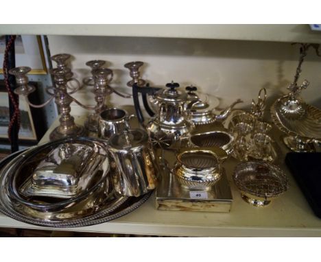 A large quantity of assorted silver plate to include tea service, candelabra etc.