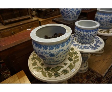 A pair of large Chinese blue and white ceramic planters.