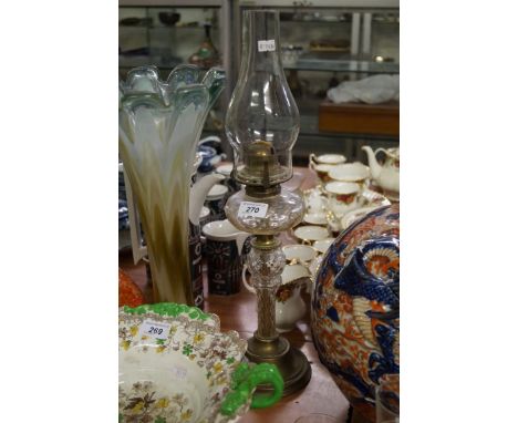 A decorative early 20th Century cut glass oil lamp.