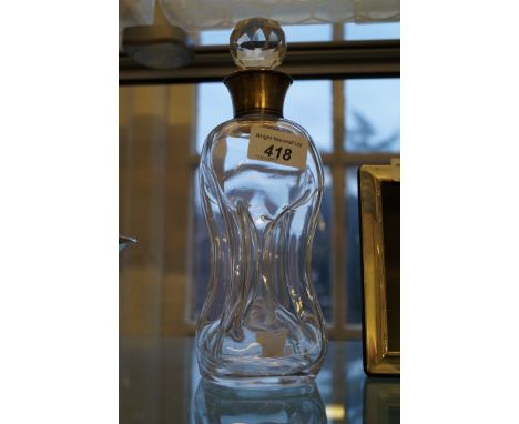 An Edward VII hallmarked silver capped pinched glass decanter, the collar Birmingham, 1905, height 25cm