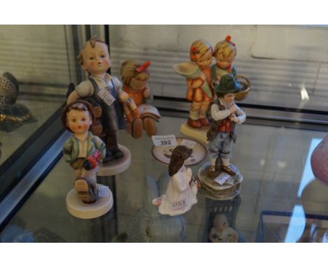 A mixed group of ceramic items to include Goebal Hummel figures, Royal Doulton miniature figure 'Innocence' and a further con