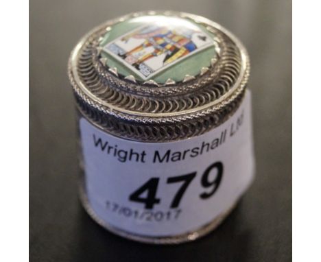 A small enamelled white metal filigree pot and lid decorated with a playing card motif.