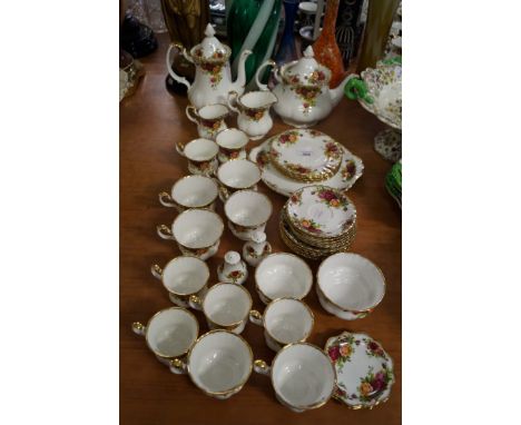 A Royal Albert Old Country Roses tea service and matching coffee service. CONDITION REPORT: One coffee cup has a small chip t