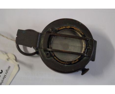 A World War II period military compass by T. G. & Co London, mark III dated 1944.