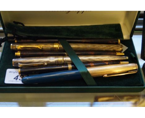 A Montegrappa cased silver pen, together with further silver pen, Parker pens and 18ct gold nibbed further Parker pen etc. (6
