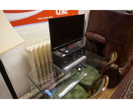 An E-Motion LED 23" TV, Ipod hifi speaker system model no. IP368 and a Philips DVD 634. (sold electrically untested).
