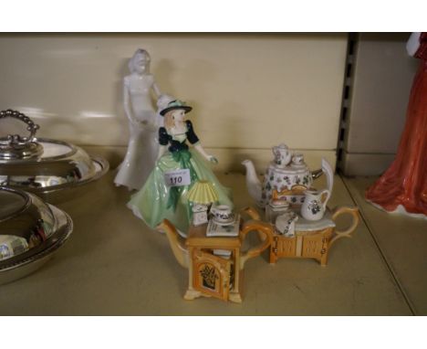 Two Royal Worcester figurines to include Mothers Love and Holly also three novelty teapots