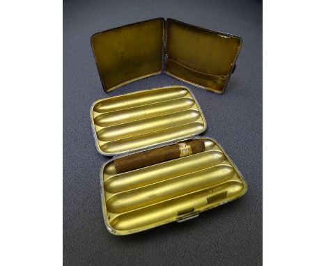 SILVER FOUR SECTION CIGAR CASE and a cigarette case, allover chase decorated with vacant cartouche and gilt interior, Birming